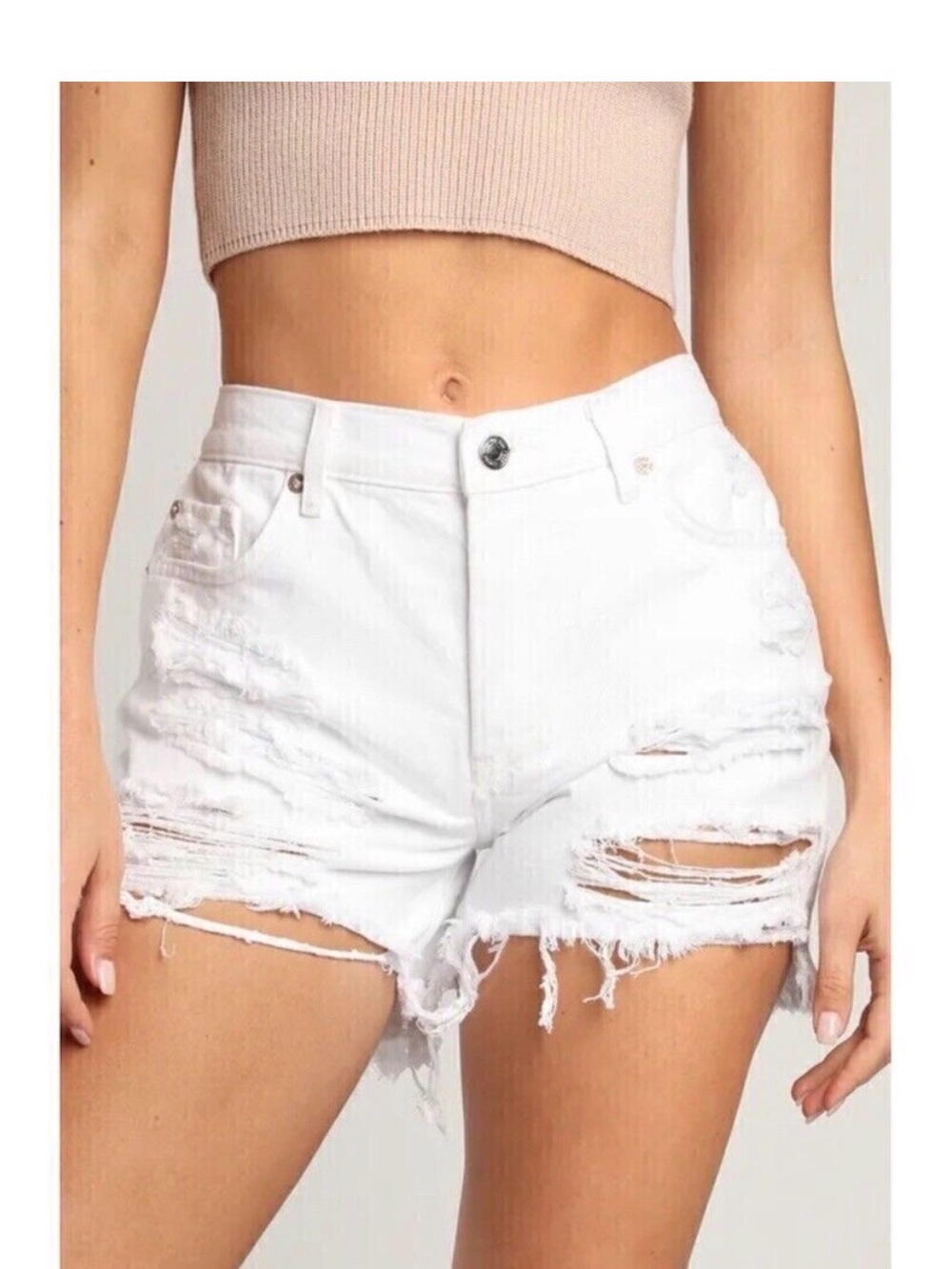 Free People we the free white distressed shorts
Size 28